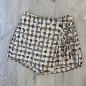 Plaid skirt with built in shorts. Mini skirt, comfortable all year wear.